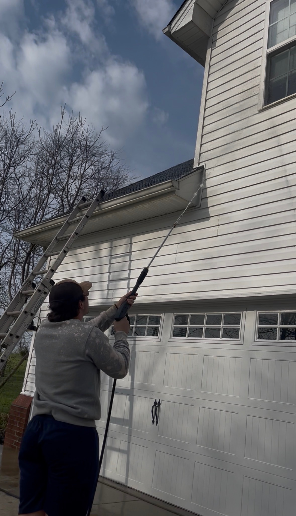 Baker's Exterior Solutions washing a home in Central Kentucky